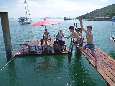 The  boys enjoy our swimming pontoon